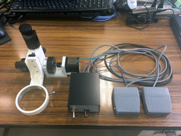 Microscope focusing system